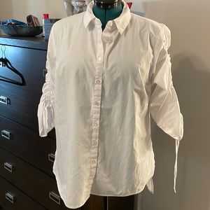 White button up shirt with detail sleeves. Size L